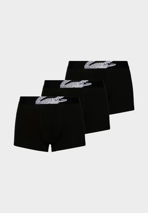 Boxers de algodón negro con una textura suave, con un logo de cocodrilo blanco en la banda elástica. Paquete de tres.