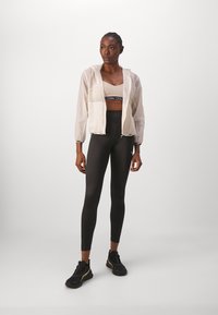 Puma ANIMAL REMIX FASHION - Trainingsvest - sugared almond