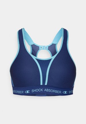Navy and light blue sports bra with a mesh texture, thick adjustable straps, and a hook closure. Features a logo on the band.