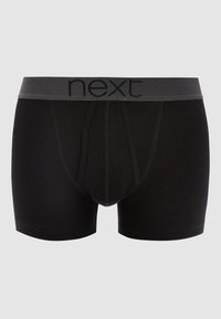 Schwarze Boxershorts aus einem Baumwollmix. Mit einem grauen elastischen Bund mit "next"-Logo. Glatte Textur und taillierte Passform.