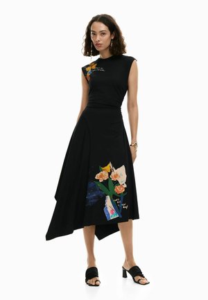 Black dress with a fitted top and asymmetric skirt, featuring colorful floral prints and the text “every day is a new day.” Soft fabric.