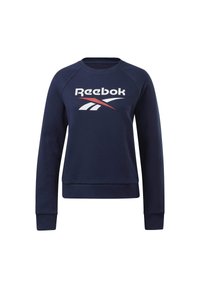 Marinblå sweatshirt med långa ärmar, rund halsringning och ribbad mudd. Har en framträdande vit Reebok-logga över bröstet med röda detaljer.