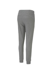 Grå sweatpants med en tapered ben-design, elastisk midja och ribbad manschett, gjorda av mjuk bomullsmaterial.
