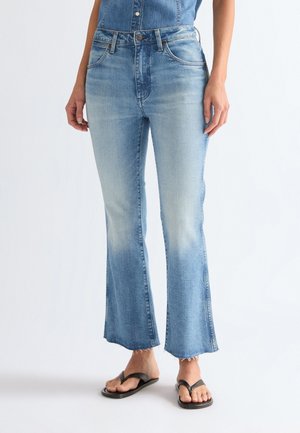 KICK - Platėjantys džinsai - american raw