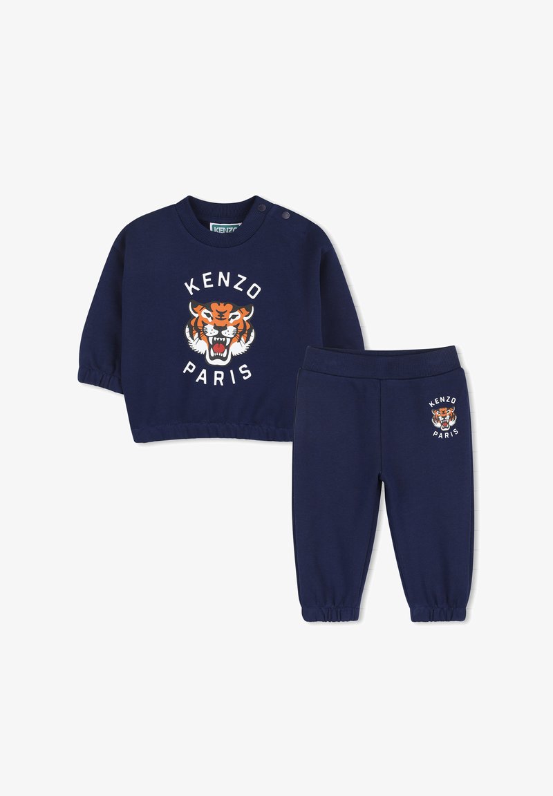 Completo per bambini composto da felpa e pantaloni blu navy con polsini elastici, con logo Kenzo Paris e grafica di una tigre sul davanti e sui pantaloni.