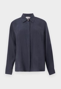 Camisa de manga larga en azul marino oscuro, hecha de una tela suave, con cuello clásico y cierre frontal de botones. Ajuste relajado con mangas con puños.