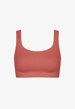 Podprsenka v jemnej korálovej farbe so štvorcovým výstrihom, širokými ramienkami a bezšvovým dizajnom. Vyrobená z elastického, hladkého materiálu pre pohodlie.