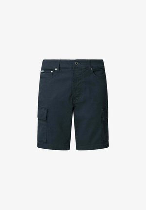 Tumed sinine taskupüks, mis on valmistatud vastupidavast puuvillaste materjalidest, mitmete taskutega, nööpidega kinni keeratav ja tugevdatud õmblustega detailidega.