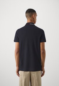Tommy Hilfiger ZIP PLACKET TIPPING  - Poloshirts - desert sky