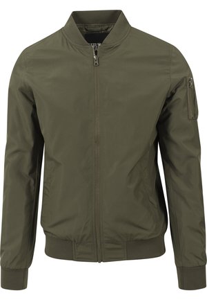 Olivgrüne Bomberjacke aus glattem Nylon. Sie verfügt über einen Reißverschluss vorne, gerippte Bündchen und eine Reißverschlusstasche am linken Ärmel.