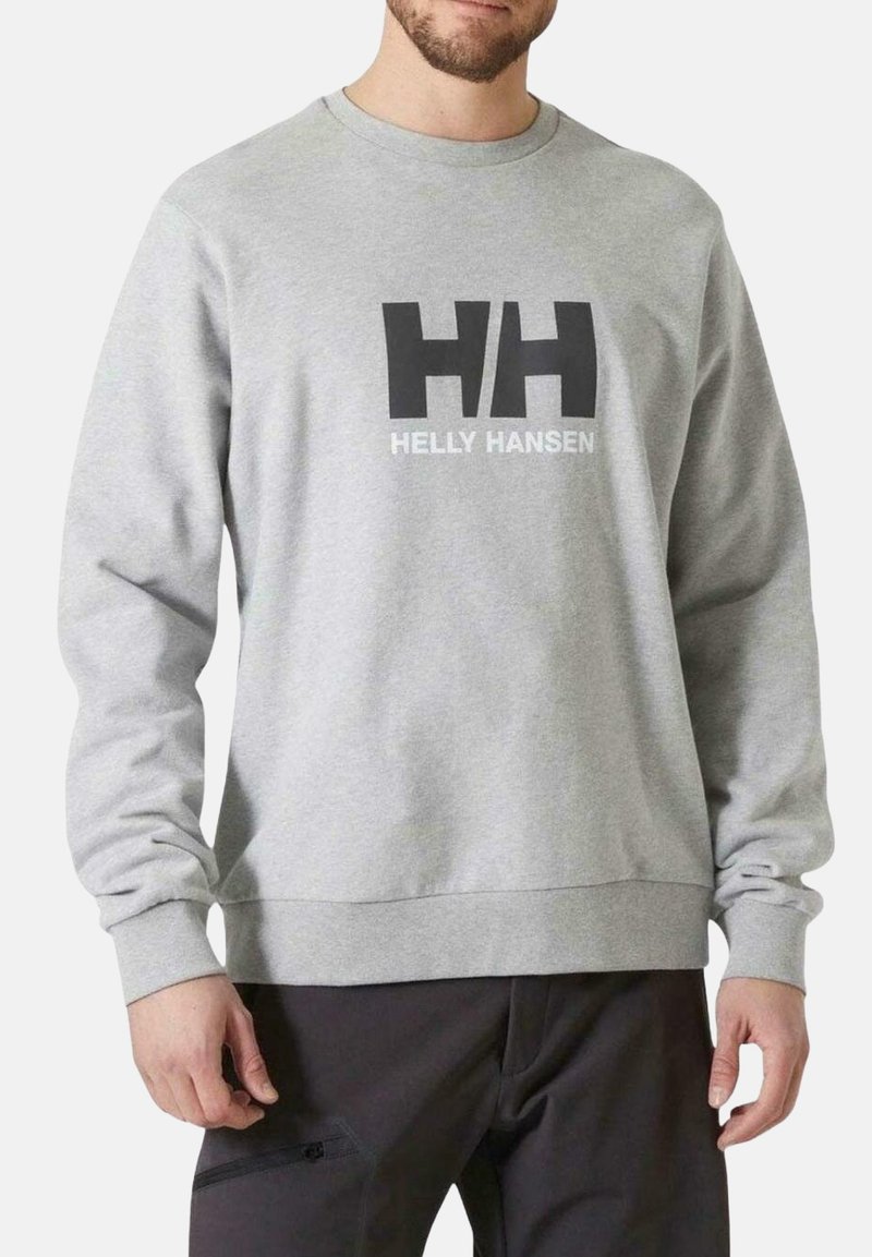 Sudadera gris hecha de una tela suave, con un logo negro "HH" y el texto "HELLY HANSEN" en gris claro. Diseño clásico de cuello redondo.