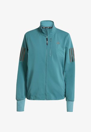 Turbokwiatowa kurtka sportowa z wysokim kołnierzem, zamkiem z przodu i brązowymi akcentami w postaci trzech pasków na rękawach. Gładka tekstura, odpowiednia do aktywności na świeżym powietrzu.