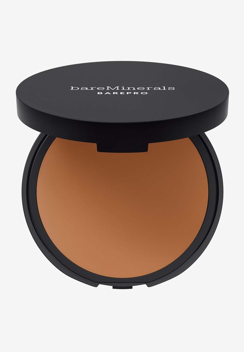 BareMinerals BAREPRO powder compact, featuring a round black casing with a matte finish and a smooth, warm-toned powder inside.