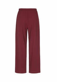 Burgundy vida byxor i mjukt tyg, med ett elastiskt midjeband och inga synliga fickor, som erbjuder en avslappnad passform.