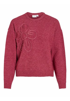 Röd stickad tröja med rund hals, med en strukturerad blomdesign på framsidan och ribbade muddar och nederkant. Mjukt material.