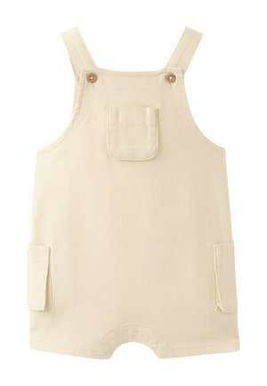 Barboteuse pour tout-petit de couleur crème avec bretelles, poche poitrine avant, deux poches latérales et fermetures à boutons sur les bretelles.