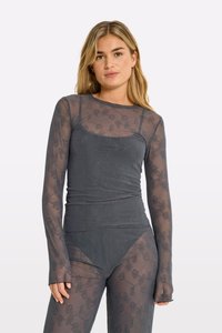 Sheer gray long-sleeve top featuring floral embroidery, crew neckline, and slim fit. Flowing texture with extended sleeves.