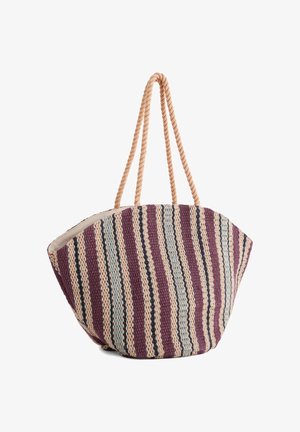 Sac fourre-tout tissé à rayures en violet, beige, bleu et noir avec des poignées épaisses en corde torsadée.