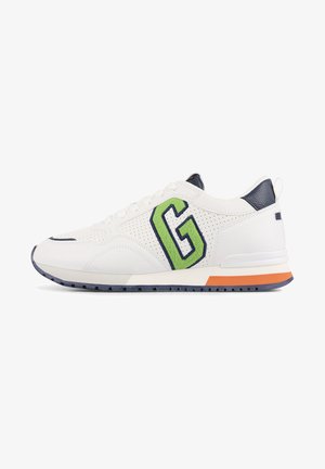 White sneaker with navy accents and a prominent green "G" logo. Features perforated texture, flat laces, and a multi-colored sole.