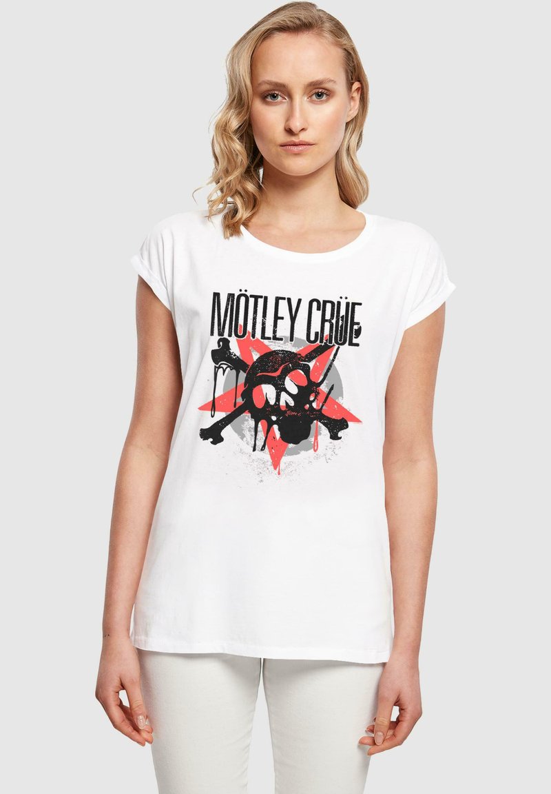 White cotton t-shirt featuring a black and red graphic of a skull and crossbones with "MÖTLEY CRÜE" text, relaxed fit and rolled sleeves.