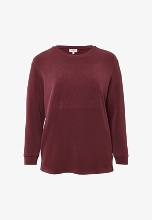 Bordowa bluza z długim rękawem z tłoczonym wzorem na przodzie, okrągłym dekoltem i ściągaczami na rękawach. Miękka bawełniana tkanina.