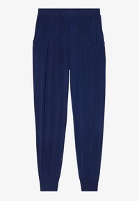 Navy blue jogger-housut pehmeällä pinnalla, elastisella vyötäröltä, kahdella sivutaskulla ja resorit hiihtoleuan joustolla. Sopii rentoon käyttöön ja mukavuuteen.