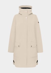 Beige lange regenjas met capuchon, voorste drukknopen, klepzakken en zwarte voering die zichtbaar is bij de kraag en de zoomopeningen.