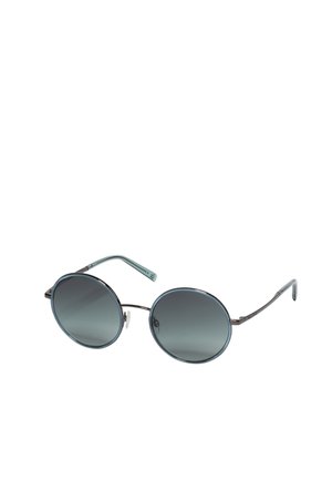 Lunettes de soleil rondes avec fines montures métalliques et verres dégradés foncés sur fond blanc.