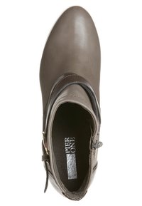 Bottine marron en cuir lisse, forme arrondie, fermeture éclair sur le côté, intérieur rembourré avec détails de la marque.