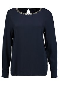Marineblaues Langarmshirt mit dekorativem, perlenbesetztem Ausschnitt und einer Schlitzöffnung auf der Rückseite. Glatte Stoffqualität und taillierte Passform.