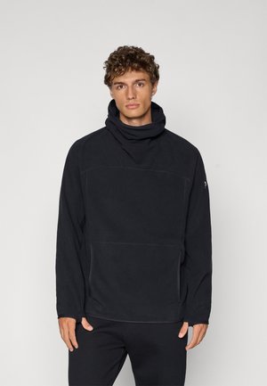 Black hoodie featuring a high collar, kangaroo pocket, and stitched detailing. Soft fabric with a relaxed fit and long sleeves.
