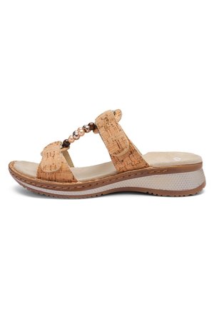 Korksandaler med beige stropper, med en dekorativ perleudsmykning. Tykt, tekstureret sål i kontrastende brune og hvide farver.