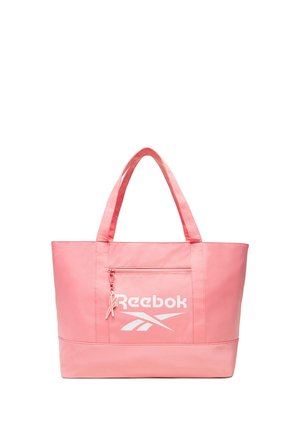 Borsa tote rosa Reebok con due manici e una tasca frontale con cerniera che mostra il logo bianco Reebok e il design a vettore.