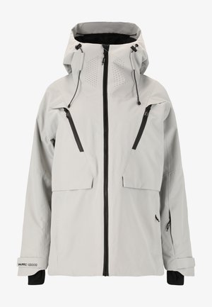 Lys grå vandtæt jakke med hætte, lynlås foran og brystlommer. Har strukturerede accenter og justerbare snore i kraven.