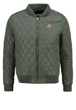 Veste bomber matelassée verte avec col et poignets côtelés, équipée d'une fermeture éclair à l'avant et d'un petit patch logo sur la poitrine à gauche.