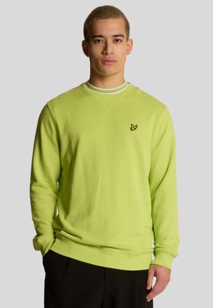 Sweatshirt vert citron avec un col rond et des rayures blanches, présentant un logo jaune brodé sur la poitrine. Fabriqué en tissu doux.