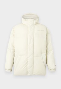 Prošívaná bunda v krémově bílé barvě s vysokým límcem, prošívaným designem, elastickými manžetami a dvěma předními kapsami. Logo umístěné na hrudi.