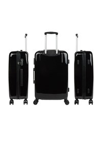 Tres maletas rígidas negras con acabado brillante, cuatro ruedas, asas extensibles y cremalleras; tamaños variados mostrados de frente, lado y espalda.