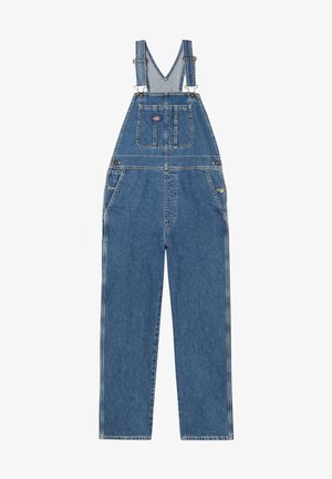 Denim üleõlaõhksed kombinesoonid reguleeritavate rihmadega, V-kujulise rinnaosaga, esipocket'iga ja küljetaskutega. Omaduseks on klassikaline sinine värv ja kontrastne õmblus.