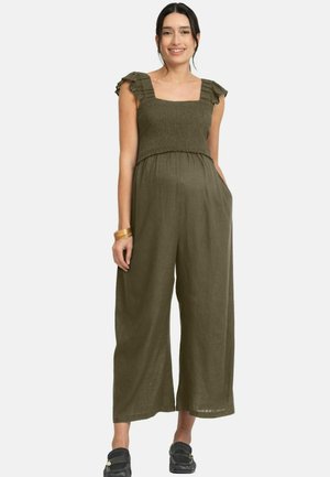 Olivengrøn jumpsuit med firkantet udskæring, flæsebesatte stropper, smocket overdel og vide ben. Fremstillet af let, struktureret stof.