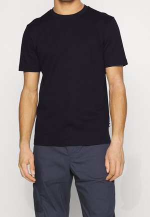 Korte mouwen, ronde hals t-shirt in marineblauw, gemaakt van gestructureerde stof. Heeft een aansluitend ontwerp en een contrasterende kraag, zonder zichtbare patronen.