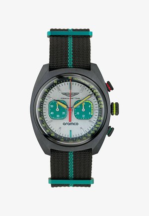 Orologio cronografo con cassa nera, quadrante argento, sottoquadranti verdi e cinturino in tessuto nero con accenti turchesi e scala tachimetrica.