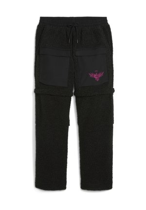 Pantaloni in pile nero con due grandi tasche frontali in materiale liscio. Presentano un logo grafico rosa e una cintura regolabile.