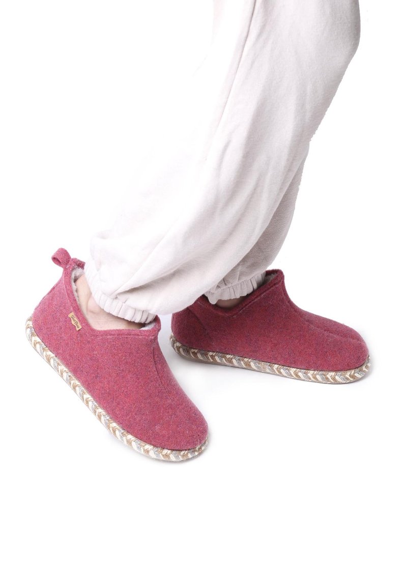 Pink felt slippers with a soft texture, low cut design, and woven rope sole. Features a small loop at the heel for easy wear.