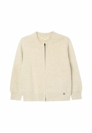 Lys beige strikket lynlåstrøje med lange ærmer og ribstrikkede manchetter, krave og kant, lagt fladt på en hvid baggrund.