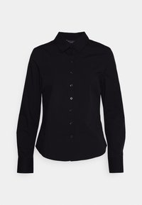 Camisa negra de manga larga con cuello clásico, cierre frontal de botones y un diseño ajustado. Textura suave sin patrones ni acentos visibles.