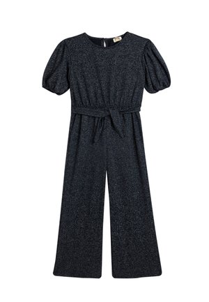 Navy blauwe jumpsuit met korte puffmouwen, elastische tailleband en een strikriem. Bevat een gestructureerde stof met een subtiele glans.
