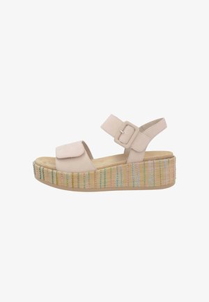 Light beige platform sandal with a textured, colorful woven base. Features adjustable strap with a buckle and a cushioned insole.