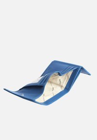 Blue leather wallet with a textured exterior, open to reveal cream lining and card slots, featuring a snap closure and a compact design.