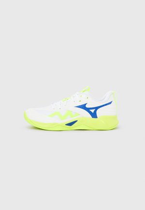 White and neon yellow athletic shoe with blue logo on side, mesh upper, white laces, and textured sole on plain background.